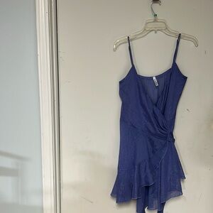 Women dress.  Wrap around dress. new but no tag